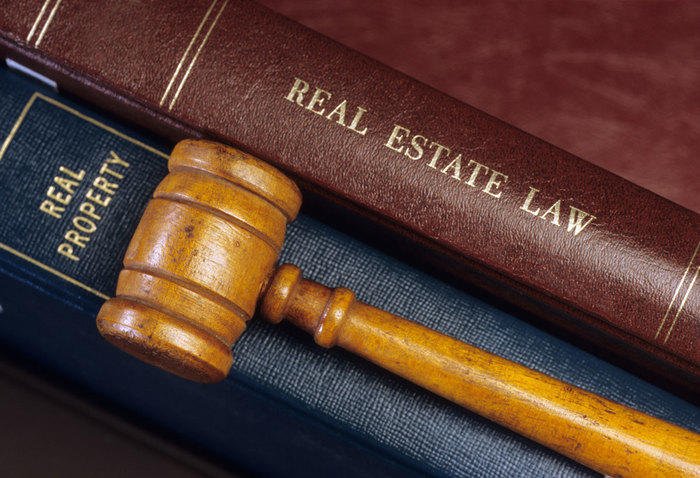 Building code violation documents reviewed by an attorney